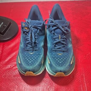 Hoka Blue Athletic Running Shoes with Gold Accents
